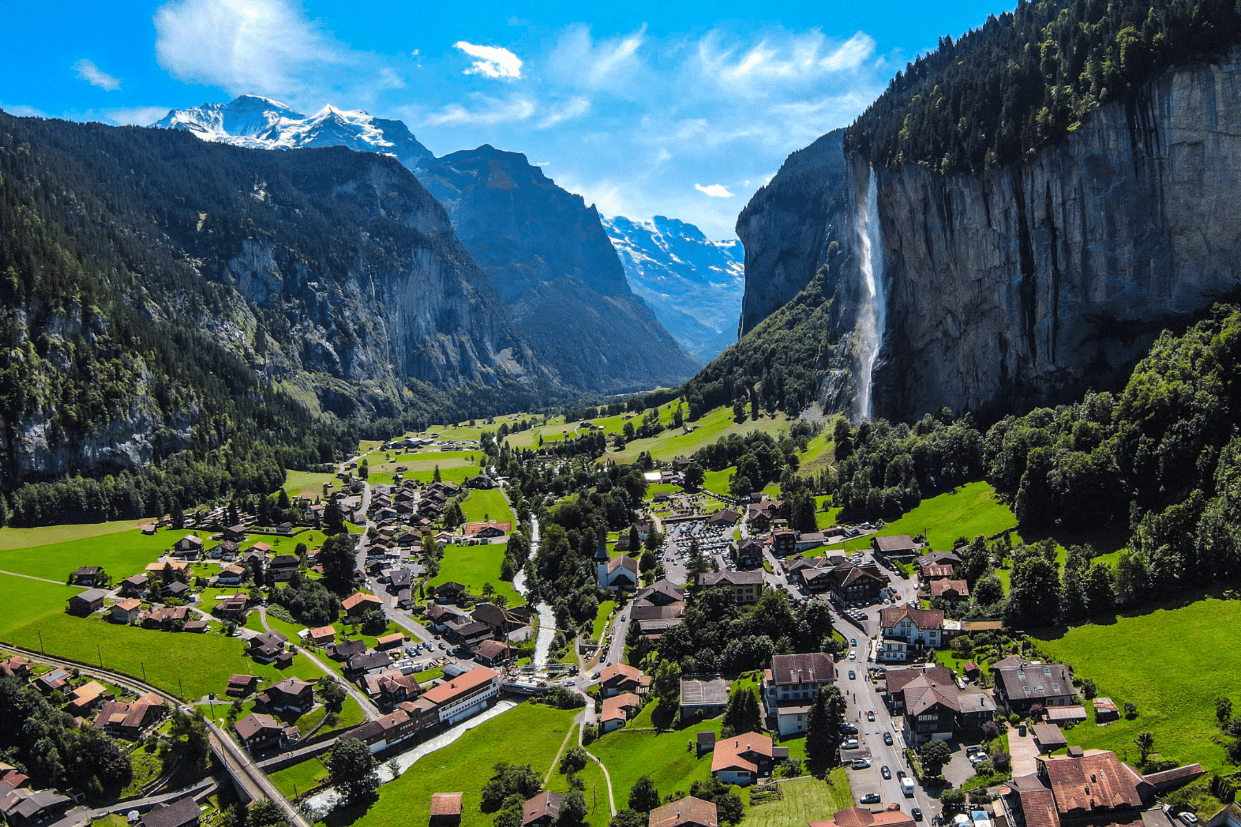 Lauterbrunnen Valley limousine service – private Swiss transfer to Alpine village with waterfalls and scenic peaks