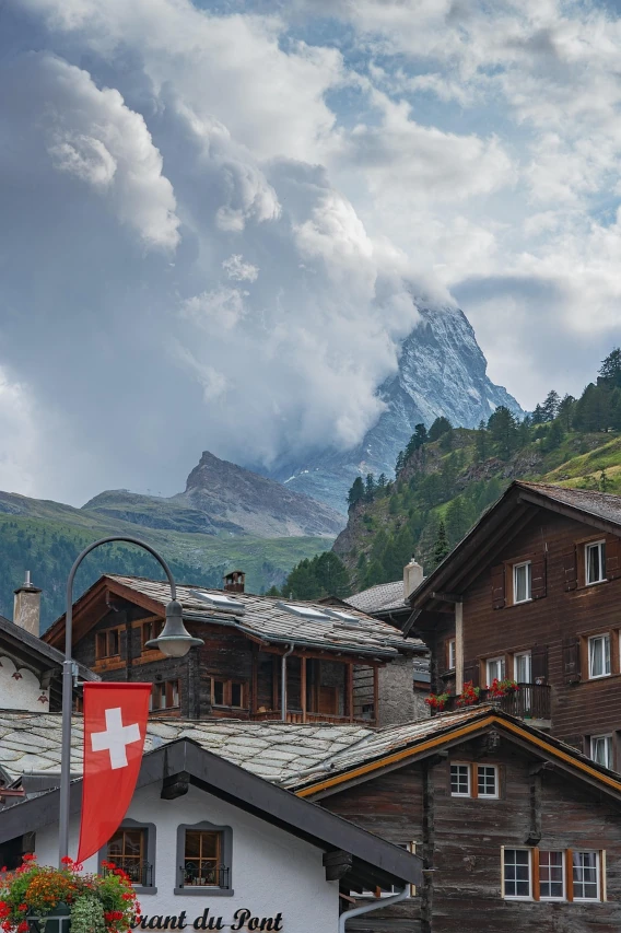 Luxury transfer from Täsch to Zermatt on a clear summer day with alpine scenery