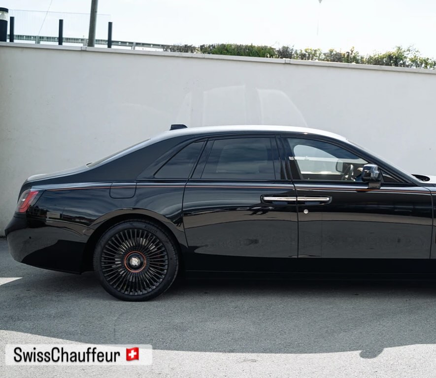 Luxury black Rolls-Royce Ghost side profile