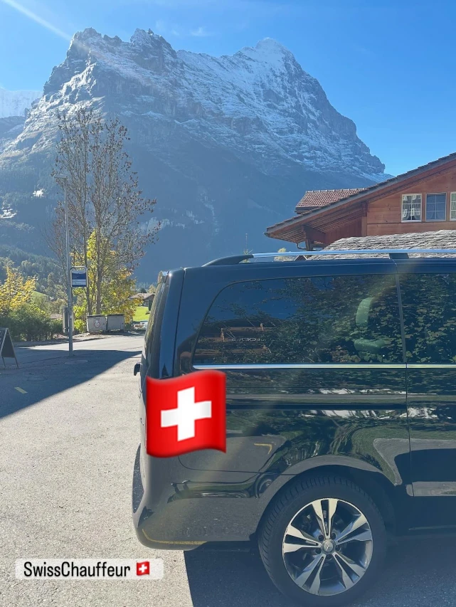 Mercedes V-Class parked in Swiss Alps with SwissChauffeur branding