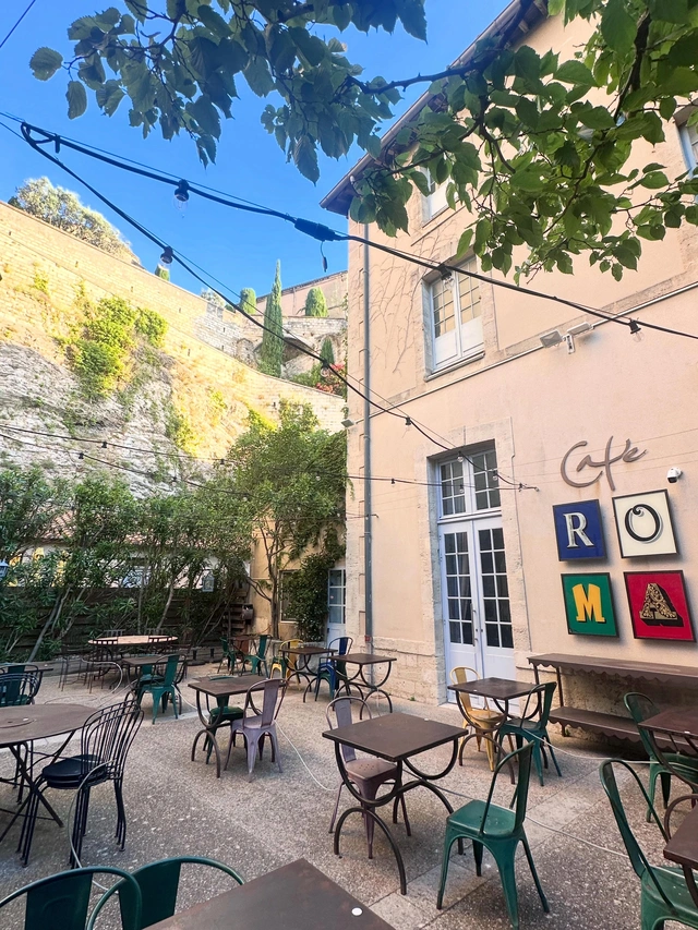 Quiet courtyard café where we stopped during our SwissChauffeur private tour of Avignon